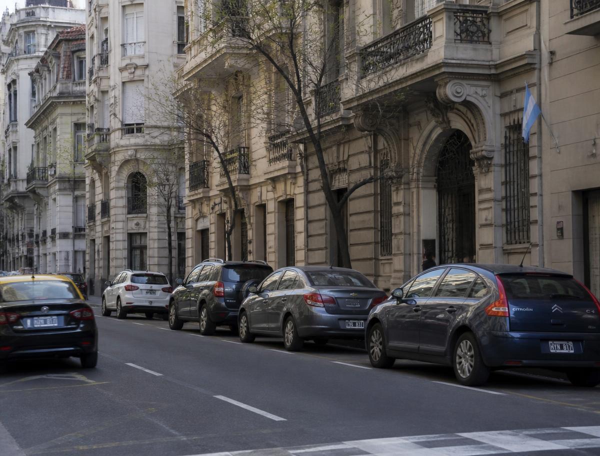 Tree-lined boulevard with Belle Epoque architecture in Buenos Aires, Argentina
